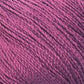 Close-up of a bundle of Halcyon Yarn's Gemstone Silk 2/12 in a rich pinkish-purple color. The fibers are tightly wound together, revealing a fine and slightly glossy texture. The image captures the intricate details of the thread, perfect for weaving or knitting with its smooth, uniform appearance.