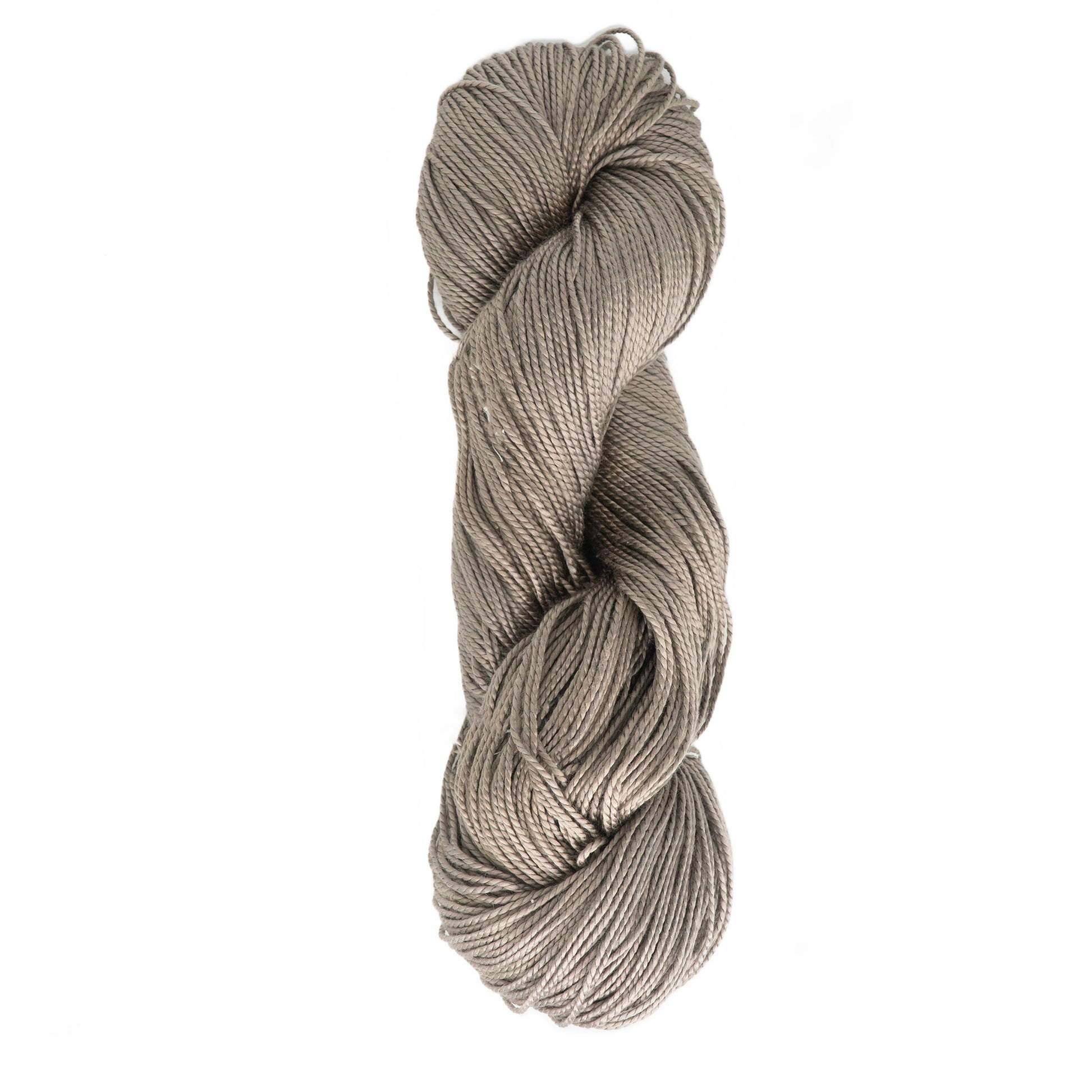 A skein of Gemstone Silk 2/5 from Halcyon Yarn, neatly twisted into a compact form, against a plain white background. The gray silk yarn appears soft and slightly shiny, perfect for weaving or knitting projects.