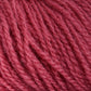 Close-up image of a ball of Victorian 2-Ply Wool Yarn by Halcyon Yarn. The Sport weight yarn exhibits a soft, fuzzy texture, with tightly wound fibers creating a slightly rough appearance. The strands run parallel and appear thick, making it suitable for hand knitting or crocheting.