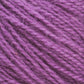 Close-up image of Halcyon Yarn's Victorian 2-Ply Wool Yarn in a rich purple hue, showcasing its visible fiber texture and strands. The yarn appears soft and slightly fuzzy with a consistent weave pattern, making it perfect for hand knitting projects.