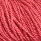 Close-up view of soft, pink Victorian 2-Ply Wool Yarn strands woven together, showcasing their texture and fibrous details. The image highlights the delicate fibers and intricate twists of this Halcyon Yarn hand knitting material.