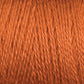 Close-up view of a spool of Maurice Brassard 8/2 Tencel Yarn | Tube in brown, showcasing its smooth, slightly glossy texture. The individual strands are tightly wound together, creating a uniform appearance—perfect for weaving projects or knitting accessories.