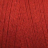 Close-up image of Maurice Brassard 8/2 Tencel Yarn | Tube in red, highlighting the texture and carefully wound fibers. The yarn strands are parallel and tightly packed together, creating a uniform and smooth surface—perfect for knitting accessories or weaving projects.