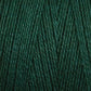 A close-up of Maurice Brassard's 8/2 Tencel Yarn | Tube in dark green, tightly wound to reveal its detailed texture and strands. The fibers look soft and subtly glossy, making them ideal for knitting or crocheting. The rich, uniform color exudes a deep, earthy tone perfect for weaving projects.