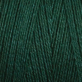 A close-up of Maurice Brassard's 8/2 Tencel Yarn | Tube in dark green, tightly wound to reveal its detailed texture and strands. The fibers look soft and subtly glossy, making them ideal for knitting or crocheting. The rich, uniform color exudes a deep, earthy tone perfect for weaving projects.