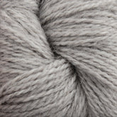 Close-up view of a bundle of Herriot Fine Alpaca yarn by Juniper Moon Farm, showcasing its soft and fluffy texture with interwoven strands. The light gray fibers appear thick and smooth, ideal for knitting or crocheting cozy items like sumptuous socks. Baby alpaca fibers add a touch of luxury to your handcrafted creations, brought to you by Knitting Fever / Euro.