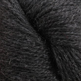 Close-up image of Herriot Fine Alpaca by Juniper Moon Farm in dark gray, showcasing its soft and fibrous texture with slight variations in color and fine strands interwoven tightly together. Ideal for creating sumptuous socks or lightweight accessories. This exquisite yarn is brought to you by Knitting Fever / Euro.