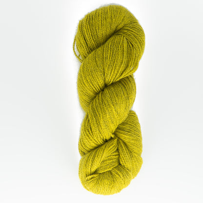 A skein of Herriot Fine Alpaca by Juniper Moon Farm, presented by Knitting Fever / Euro, in a vibrant lime green hue, boasts a soft and slightly fluffy texture. Coiled in a twisted hank against a plain white background, this yarn is ideal for knitting or crocheting lightweight accessories. Its superior quality makes it perfect for creating sumptuous socks or cozy wearables.