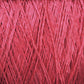 Close-up of Newport 16/2 Linen Yarn | Large Cone from Halcyon Yarn. The image shows multiple strands of linen yarn intertwined, forming a tightly knit texture. The vibrant red color and fine fibers give the yarn a smooth and glossy appearance.