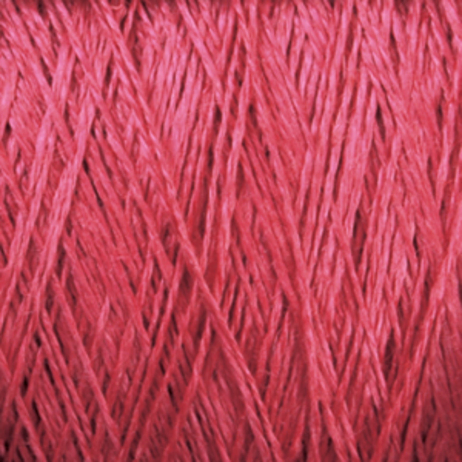 Close-up of Newport 16/2 Linen Yarn | Large Cone from Halcyon Yarn. The image shows multiple strands of linen yarn intertwined, forming a tightly knit texture. The vibrant red color and fine fibers give the yarn a smooth and glossy appearance.