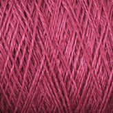 Close-up image of Halcyon Yarn's Newport 16/2 Linen Yarn wound tightly in a large cone, showcasing the detailed texture and intertwined fibers. The yarn appears soft and smooth, with a rich color that stands out.