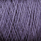 Close-up image of a ball of Halcyon Yarn's Newport 16/2 Linen Yarn | Large Cone in purple, showing its soft, textured fibers intertwined in various directions. The threads exhibit a slight sheen, highlighting the yarn's texture and thickness.