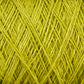 Close-up image of a tightly wound yellow ball of yarn, with strands crisscrossing each other in a detailed pattern. The texture is soft and fibrous, showcasing the weave and twist of individual fibers, reminiscent of high-quality Newport 16/2 Linen Yarn | Mini-cone from Halcyon Yarn.