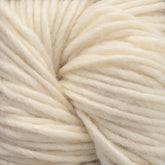 A close-up of a bundle of thick, soft, ivory-colored Moonshine yarn by Juniper Moon Farm from Knitting Fever / Euro, showcasing the texture and twisting strands.