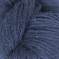 Close-up image of dark blue extrafine baby alpaca yarn. The DK weight fibers are tightly twisted together, creating a thick and textured appearance. The overall image highlights the softness and detail of the individual fibers, showcasing the luxurious quality of Juniper Moon Farm Herriot Baby Alpaca by Knitting Fever / Euro.