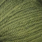 Close-up image of Juniper Moon Farm Herriot Baby Alpaca yarn in green. The fibers from Knitting Fever / Euro are tightly twisted, creating a textured pattern. The color is a rich, even shade of green, perfect for knitting or crocheting projects with luxurious extrafine baby alpaca.