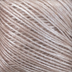 Close-up image of a ball of light beige Katia Air Lux fingering weight yarn by Knitting Fever / Euro, featuring its slightly shiny texture and intricate overlapping strands with fibrous details. The image highlights the smoothness and soft appearance of the Merino wool yarn.