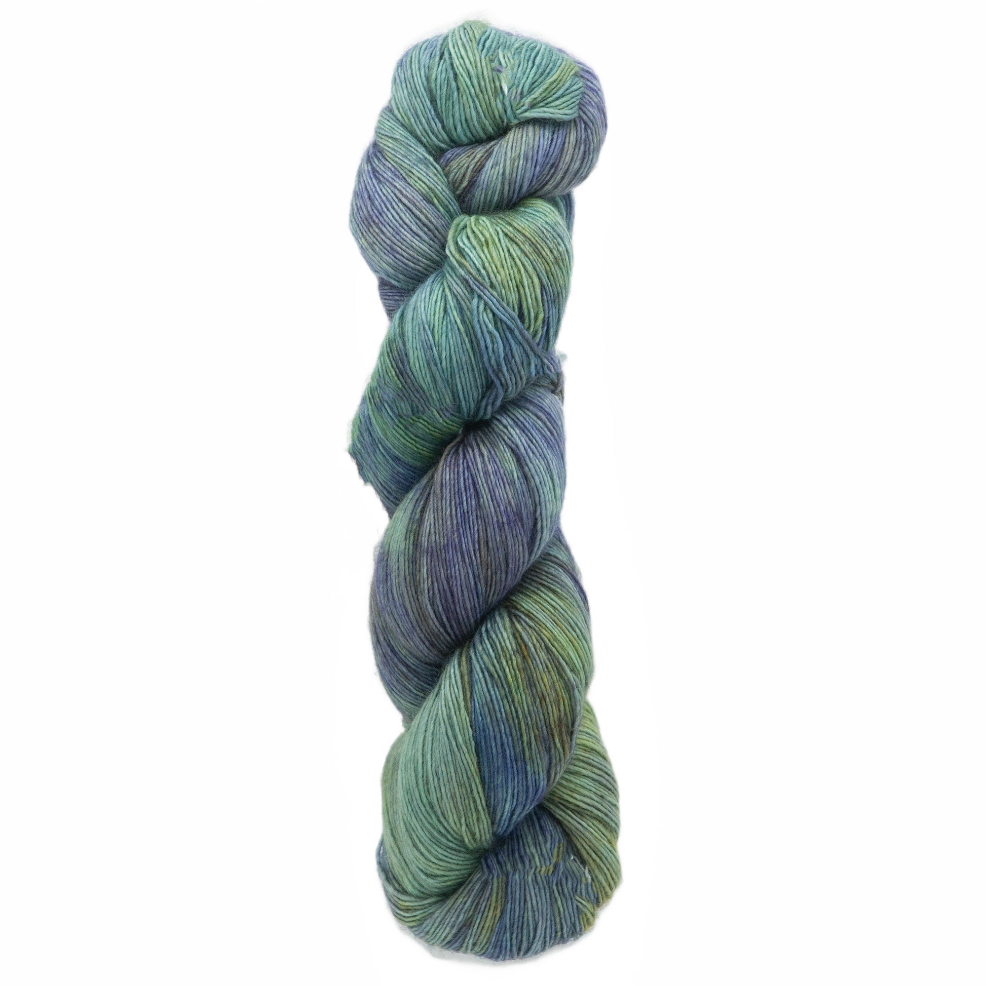 A skein of Malabrigo Yarn's Malabrigo Lace, featuring vibrant green, blue, and purple tones artistically intertwined. Its fine lace weight merino texture feels remarkably soft and delicate, making it an ideal choice for knitting airy shawls or crafting intricate garments through crochet.