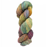 A skein of Malabrigo Sock, a multicolored yarn by Malabrigo Yarn, kettle dyed in vibrant shades of green, orange, purple, blue, and yellow. This versatile yarn is tightly twisted and displayed against a plain white background.