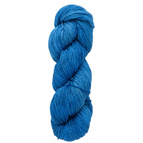 A neatly wound skein of Malabrigo Sock by Malabrigo Yarn in a vibrant, bright blue color against a plain white background. The kettle-dyed superwash merino wool displays its soft texture and subtle sheen beautifully.