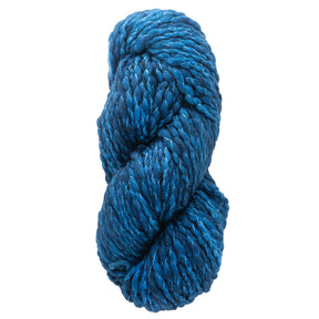 A skein of Malabrigo Caracol by Malabrigo Yarn is tightly twisted and kettle-dyed in blue, highlighting its rich texture and vibrant color. The super bulky yarn is thick with a slight gloss, neatly coiled against a plain white background.