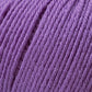 Close-up view of Cascade 220 Superwash Wool Yarn by Cascade Yarns in a vibrant purple shade, showcasing its tightly wound strands with a slightly fuzzy texture, perfect for knitting or crocheting projects. The image highlights the rich color and fine detail of this 100% merino DK weight wool yarn's fibers, promising beautiful stitch definition.