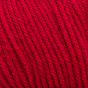 Close-up of bright red Cascade 220 Superwash Wool Yarn from Cascade Yarns, showcasing its smooth and tightly twisted strands. The texture appears soft and slightly fuzzy, with the 100% merino wool fibers tightly wound together in a uniform pattern. The vibrant color is consistent throughout, offering beautiful stitch definition.