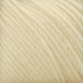 Close-up of cream-colored, soft, and smooth Cascade 220 Superwash Wool Yarn with tightly twisted strands running diagonally across the image. Made from 100% merino wool by Cascade Yarns, this DK weight yarn offers beautiful stitch definition and appears plush and suitable for knitting or crocheting.