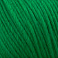 A close-up image of Cascade Yarns' Cascade 220 Superwash Wool Yarn in green, made from 100% merino wool. The yarn is tightly wound and highlights the texture of the fibers, which appear soft and slightly fuzzy. The strands are neatly arranged in parallel lines, showcasing the detailed twists and beautiful stitch definition of this superwash DK weight yarn.