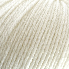 Close-up image of a ball of Cascade 220 Superwash Wool Yarn by Cascade Yarns, highlighting the soft, woven fibers and texture. The 100% merino wool yarn is neatly twisted and appears smooth and fluffy, with beautiful stitch definition indicating it's suitable for knitting or crocheting projects.