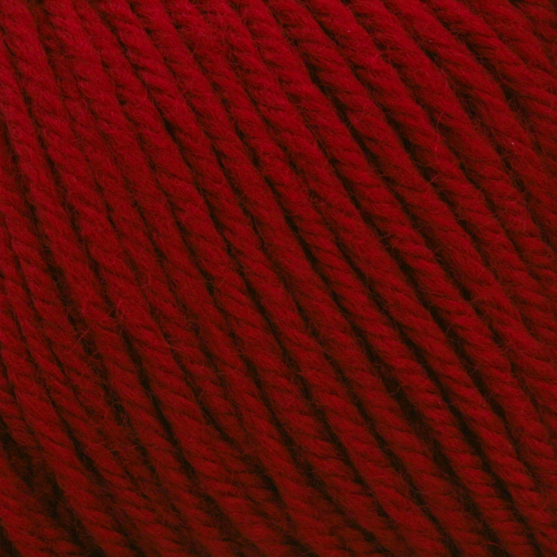 Close-up of tightly-wound, dark red Cascade 220 Superwash Wool Yarn by Cascade Yarns, showing detailed texture and fibers. The strands are consistently twisted and parallel, showcasing the beautiful stitch definition of this 100% merino wool.