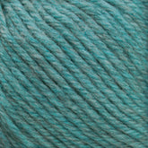 Close-up image of teal-colored Cascade 220 Superwash Wool Yarn by Cascade Yarns, showing its twisted strands and slightly fuzzy texture. The 100% merino wool, superwash DK weight yarn offers beautiful stitch definition.