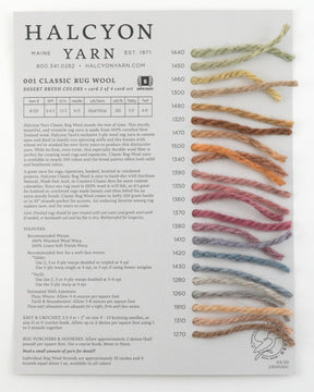 The Classic Rug Wool Sample Card by Halcyon Yarn features a range of colorfast wool samples in the 001 Halcyon Classic Rug Wools yarn from the Desert Brush Colors series. Each sample is twisted into a small loop and arranged in a row, showcasing corresponding color numbers from 1310 to 1450.