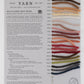 Image of a Halcyon Yarn product sheet for their Classic Rug Wool Sample Card, featuring the Maine Coast Colors collection. The sheet displays yarn color names beside 17 samples of vibrant, colorfast wool in shades of brown, red, blue, and green. Each swatch is carefully labeled with its corresponding number and name.