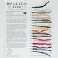 The Alafoss Icelandic Lopi Sample Card from Halcyon Yarn features 14 distinct shades of 100% Icelandic wool yarn. Each sample is meticulously labeled with its color name and number, with the corresponding yarn attached next to its label. This card showcases a variety of colors, from white to dark grey alongside vibrant hues, highlighting the warm and durable fiber of Alafoss Lopi yarn.