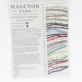 A sample card from Halcyon Yarn featuring Jo Sharp Silkroad DK & Aran Tweeds. The left side provides contact info, yarn details, and descriptions. The right side showcases 20 different yarn samples in various colors, each labeled with a corresponding color name and number.