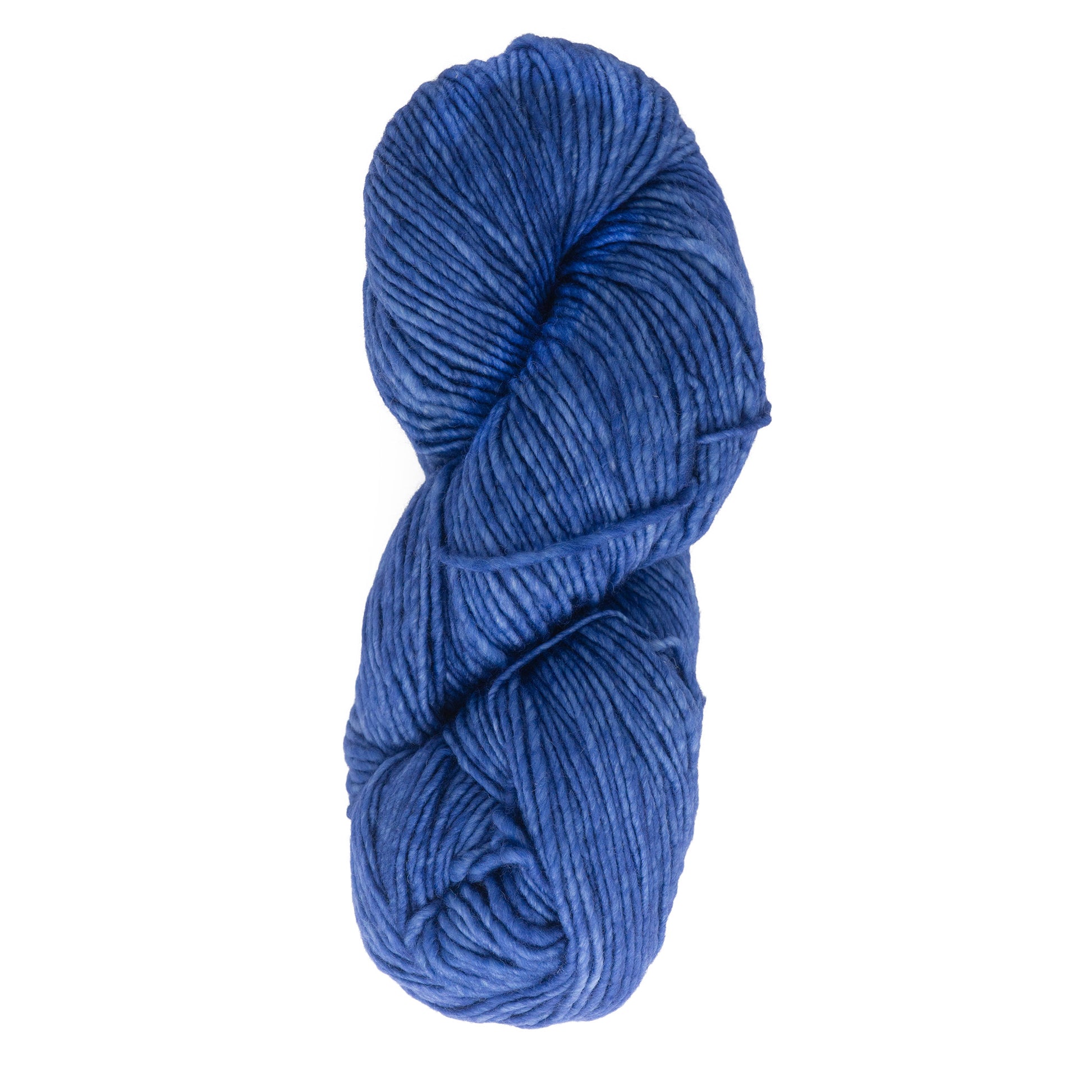 A skein of Malabrigo Merino Worsted Wool Yarn from Malabrigo Yarn, kettle-dyed in deep blue and neatly coiled in an oval shape, displays a soft and slightly shiny texture against a plain white background. The yarn, with its thick worsted weight gauge, is perfect for cozy knitting or crocheting projects.