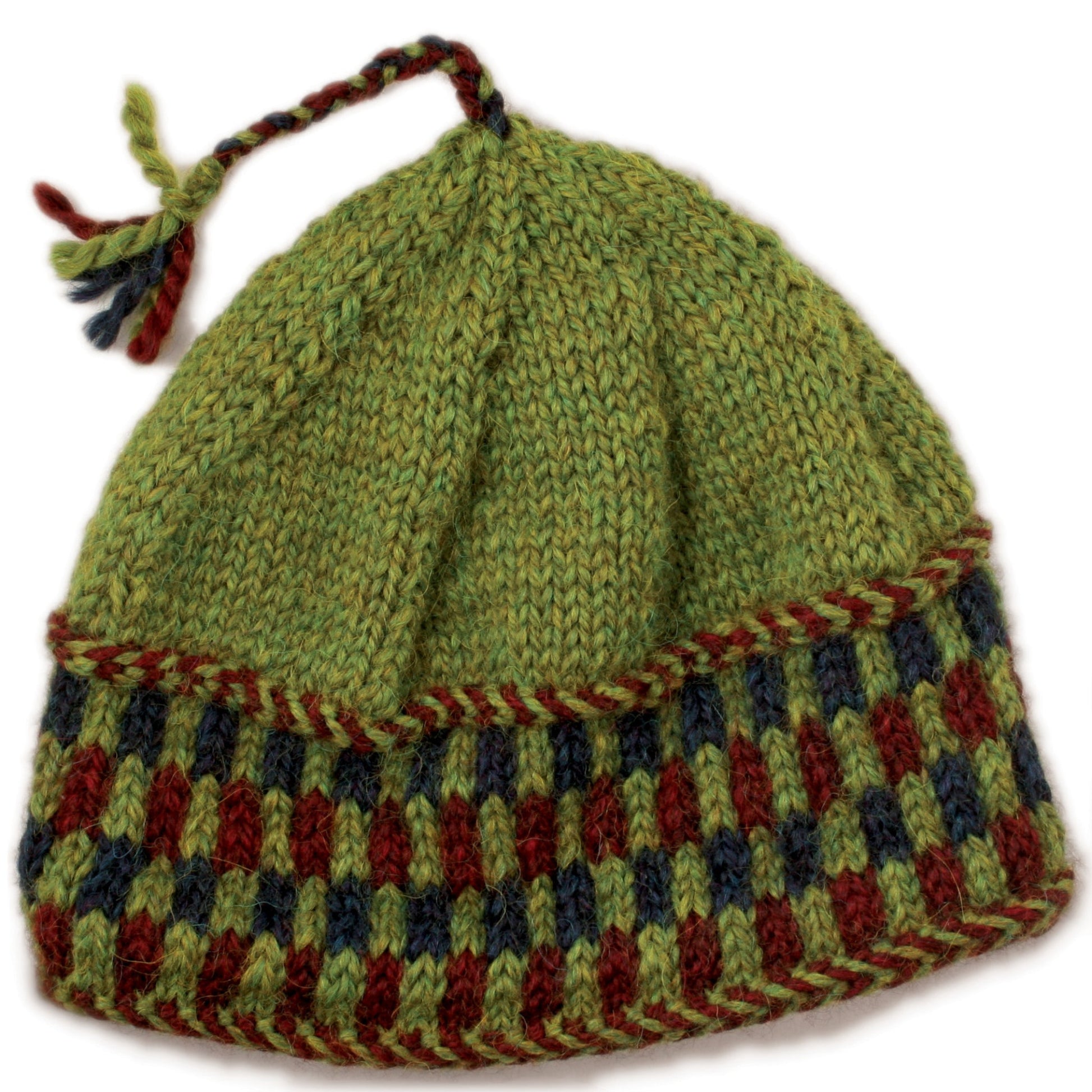 The Checkerboard Hat by Halcyon Yarn is a warm, knitted green hat with a checkered pattern in red and green along the bottom. It also features a small braided tassel on top incorporating red, green, and yellow threads, adding a soft touch to its cozy design.