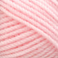 Close-up image of Plymouth Encore Worsted Yarn by Plymouth Yarn Co. in a soft, light pink shade. The yarn is thick, woolly, and loosely twisted, with a slightly fuzzy texture, filling the entire frame. The strands are evenly aligned, showcasing the detailed fiber composition and smooth pastel pink color—an economical option perfect for various projects.