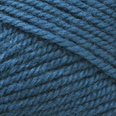 Close-up view of Plymouth Encore Worsted Yarn from Plymouth Yarn Co. in a rich teal blue, wound into a ball. The texture is detailed, showcasing tightly twisted fibers with a slight fuzziness. This soft and thick worsted weight yarn appears perfect for knitting or crocheting, offering an affordable option that is also machine washable.