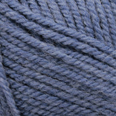 Close-up image of Plymouth Encore Worsted Yarn fibers from Plymouth Yarn Co., showing a coiled and tightly woven blue texture. The yarn appears soft and slightly fuzzy, highlighting the intricacies of the individual threads that make up this economical option.