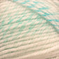 Close-up image of soft Plymouth Encore Worsted Yarn from Plymouth Yarn Co. with a blend of white and light blue colors, showing the twisted fibers creating a bulky texture. The yarn appears fluffy and plush, suitable for cozy knitting or crochet projects. Plus, it’s an economical option that's also machine washable.