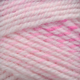 Close-up of Plymouth Encore Worsted Yarn by Plymouth Yarn Co., showcasing its soft, chunky texture with a twisted appearance. This worsted weight yarn blends light pink and white colors, creating a smooth and fluffy look. The intertwining pink and white strands give a marbled effect to the overall aesthetic while providing an economical option for crafters.