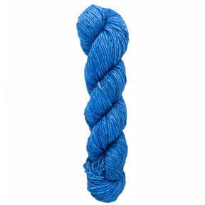 A skein of Malabrigo Silky Merino by Malabrigo Yarn, a luxurious silk blend in a soothing blue, lies twisted neatly against a plain white background.