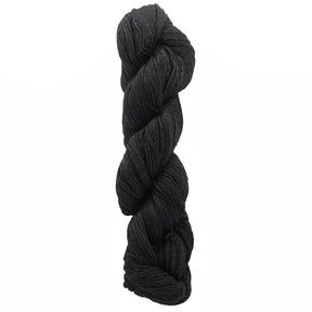 A skein of Malabrigo Silky Merino yarn from Malabrigo Yarn is tightly twisted to highlight its texture. This dark gray yarn feels soft and thick, making it ideal for crafting cozy knit or crochet garments and accessories. Made from high-quality merino fibers, it radiates elegance against the plain white background.