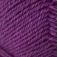 Close-up image of Jo Sharp Classic DK Wool by Kingfisher Yarn & Fibre, featuring a ball of rich, deep purple yarn with tightly wound fibers and visible texture. The image highlights the strands' thickness and twist, showcasing the yarn's smooth and even surface. Made from premium grade wool.