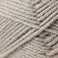 Close-up image of a beige ball of yarn, showcasing its tightly wound strands and smooth texture. This Jo Sharp Classic DK Wool by Kingfisher Yarn & Fibre exemplifies the versatility and quality associated with premium grade wool.