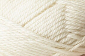 A close-up image of Jo Sharp Classic DK Wool by Kingfisher Yarn & Fibre. The tightly wound cream-colored strands reveal the texture and thickness of the premium-grade wool fibers, showcasing their soft and smooth appearance. The image captures the intricate details and natural warmth of this versatile DK gauge yarn.