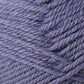 Close-up of a ball of lavender-colored Jo Sharp Classic DK Wool from Kingfisher Yarn & Fibre with tightly wound fibers, showcasing its soft texture and slight sheen. The image highlights the detailed strands and the overall smoothness of this versatile DK gauge yarn, making it ideal for knitting or crocheting projects.