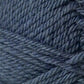 Close-up of dark blue Jo Sharp Classic DK Wool from Kingfisher Yarn & Fibre shows the intricate texture and parallel strands. The yarn appears thick and soft, tightly wound in a skein, exemplifying its premium grade quality.